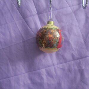 Disney the hunch back of notre dame vintage ornament in cream and red.